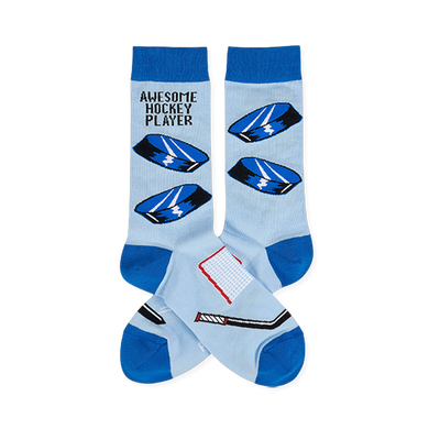 Light blue crew socks with blue cuffs, heels, toes. Features hockey pucks, net, stick, and "Awesome Hockey Player" text.
