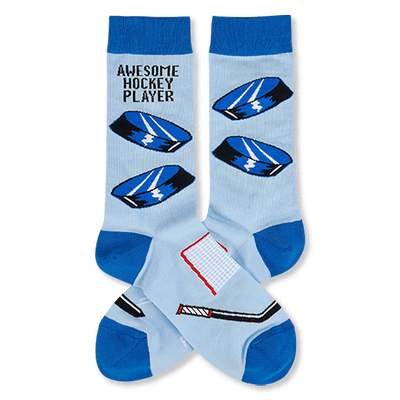 Light blue crew socks with blue cuffs, heels, toes. Features hockey pucks, net, stick, and "Awesome Hockey Player" text.