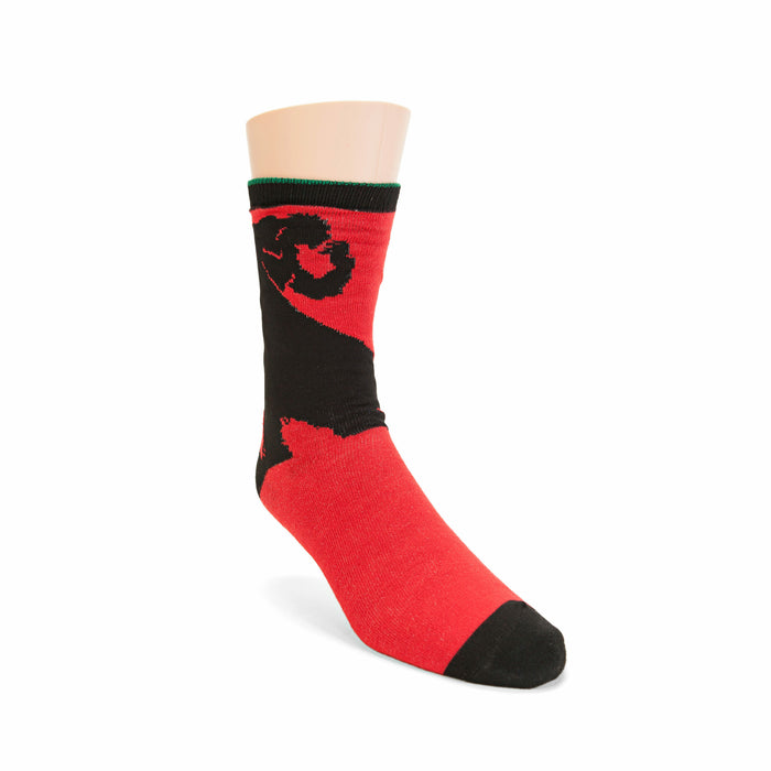 Lifestyle shot of the red and black Wind Waker themed socks on a person's feet.
