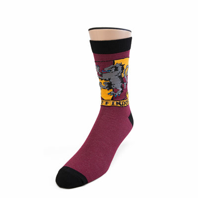 mens crew harry potter gryffindor socks. burgundy with black toes and heels with golden yellow triangle with grey lion.   