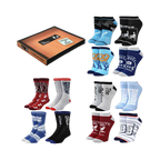 Product shot of The Office 12 Days of Socks Box Set. Features crew and ankle socks in red, gray, blue, and black with The Office logos and quotes.