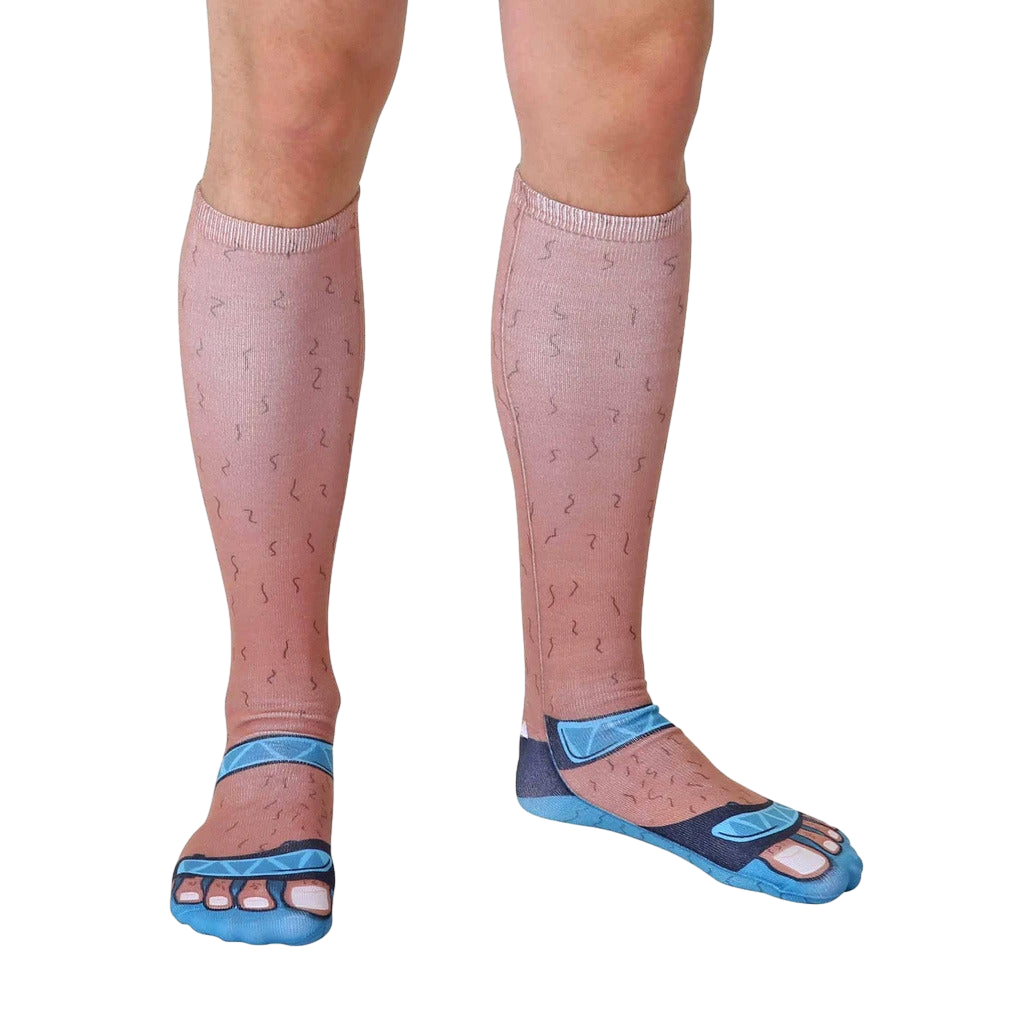 Another full view of the Socks & Sandals Tan socks, showing the hairy leg and sandal design on a pair of legs. [lf]