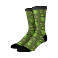 Crew socks in olive green with a repeating pattern of cartoon pickles wearing sunglasses and the phrase 'Dill With It'.