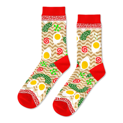 Pair of crew socks with a ramen noodle and fried egg pattern on a beige background, with red cuffs, heels, and toes.