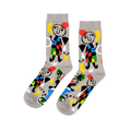 A pair of light grey crew socks with a vibrant abstract pattern, featuring black-outlined figures, colorful shapes, and green eyes.