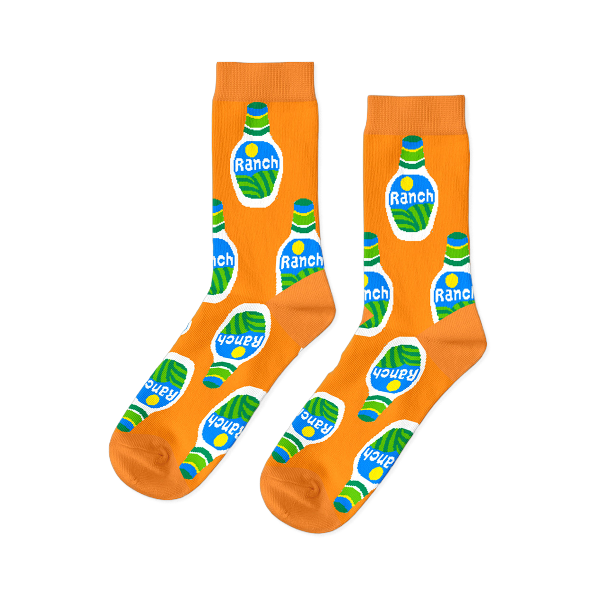 A pair of bright orange crew socks with an all-over repeating pattern of white ranch dressing bottles with green and blue accents.