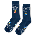 Flat lay of navy blue crew socks with white text reading FATHER OF THE FREAKING YEAR and a gold medal with colorful ribbons.