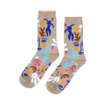 Pair of crew socks with an abstract Matisse-inspired pattern featuring blue figures, faces, stars, and leaves on a tan background.