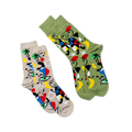 Two pairs of abstract art crew socks. One pair is olive green, the other light beige, both with colorful art patterns.
