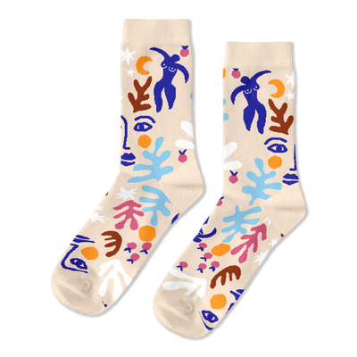 Pair of crew socks with abstract, Matisse-style cut-outs in blue, orange, pink, white, and brown on a cream background.