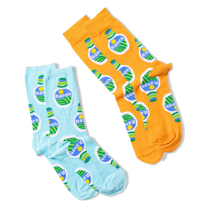 Two pairs of ranch dressing bottle socks are displayed, one pair is light blue, and the other is orange.