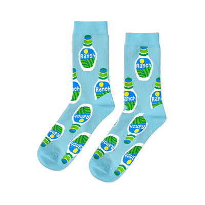 A pair of light blue crew socks with a repeating pattern of white ranch dressing bottles on a black background.