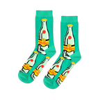 Pair of aqua crew socks featuring a repeated pattern of clear glass Topo Chico-style bottles with yellow caps and 'Top Chica' labels.