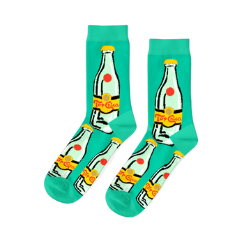 Pair of aqua crew socks featuring a repeated pattern of clear glass Topo Chico-style bottles with yellow caps and 'Top Chica' labels.