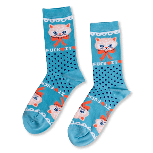 Pair of teal crew socks with dark blue polka dots. Features a light peach cat face, orange bow, and 'FUCK IT' text. }}