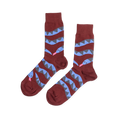 Pair of reddish-brown crew socks laid flat, featuring coiled blue and gray snake patterns with pink tongues, on a white background.