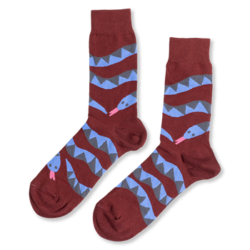 Pair of reddish-brown crew socks laid flat, featuring coiled blue and gray snake patterns with pink tongues, on a white background.
