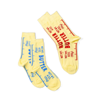 Three butter-themed ankle socks against a black background, two with blue text stacked on left, one with red text angled on right.