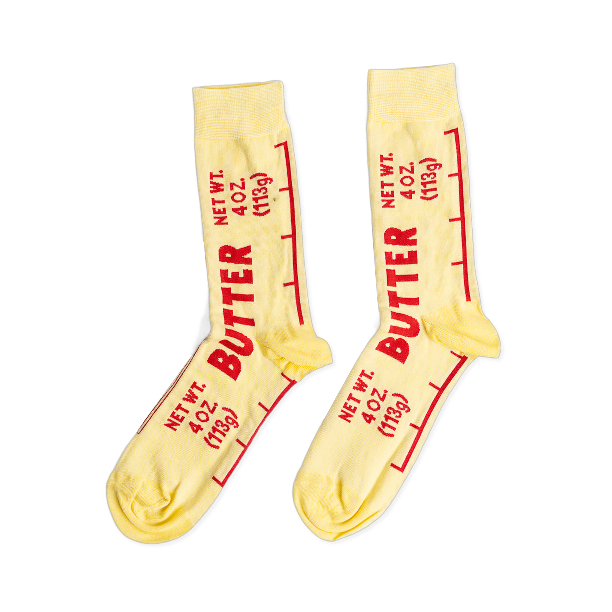 A pair of light yellow ankle socks printed with 'BUTTER' and 'NET WT. 4 OZ. (113g)' in red text, mimicking a stick of butter wrapper.