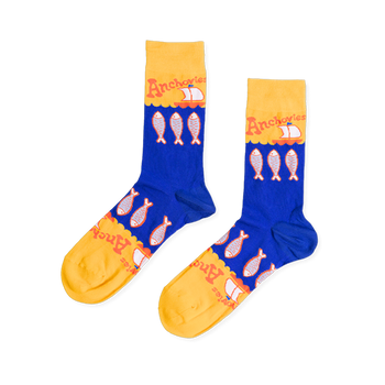 Pair of blue and yellow crew socks with a pattern of silver anchovy fish, 'Anchovies' text, and small sailboats.