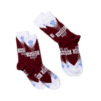 Two pairs of deep red Kosher Salt crew socks arranged diagonally, showing the full "KOSHER SALT" and diamond design.