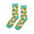 Pair of crew socks with a desert theme. Features green saguaro and prickly pear cacti, orange suns, on a peach-pink and mint green striped background.