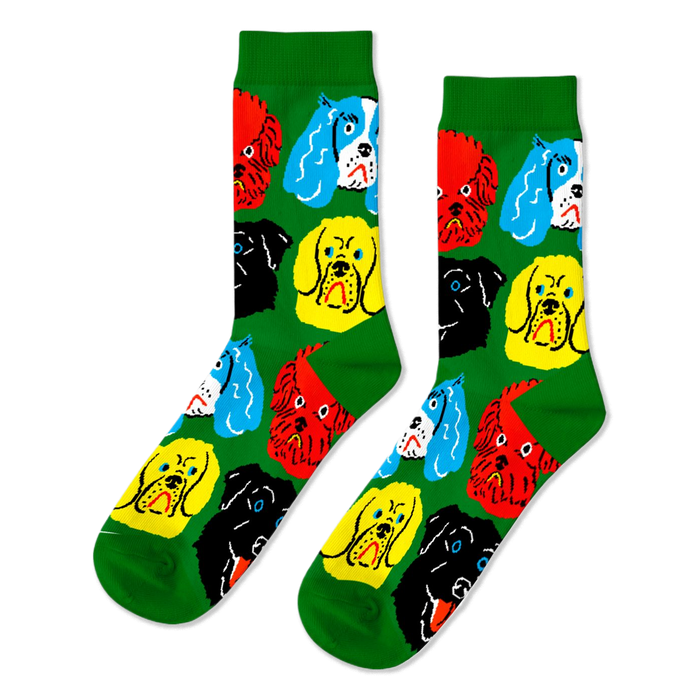 A pair of bright green crew socks featuring a repeating pattern of colorful cartoon dog faces in red, yellow, black, and blue.