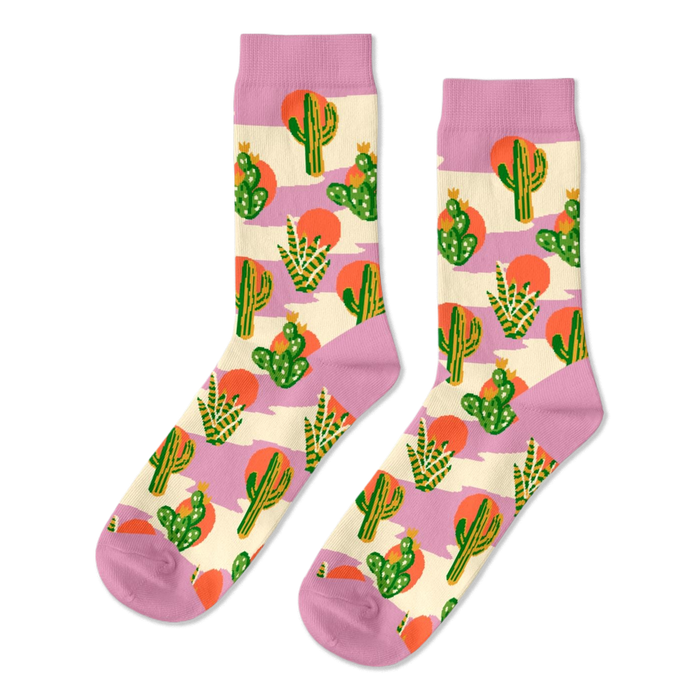 Pair of crew socks with a Southwest cactus pattern. Green cacti, orange suns, and lavender stripes on a cream background.