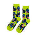 Pair of crew socks with a repeating pattern of stylized black and blue wild cat faces, snarling, on a neon lime green background.