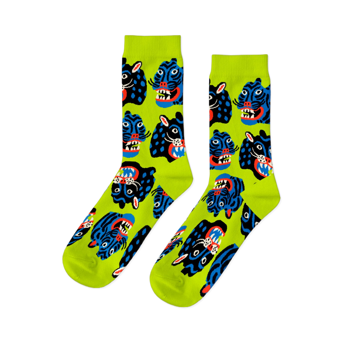 Pair of crew socks with a repeating pattern of stylized black and blue wild cat faces, snarling, on a neon lime green background.