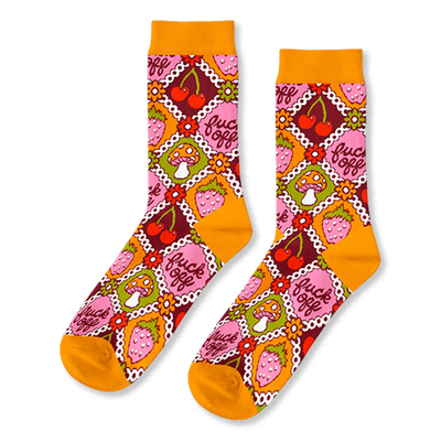 Pair of crew socks in a retro pattern. Features orange, pink, red, and green squares with cherries, strawberries, mushrooms, and the phrase 'fuck off'.
