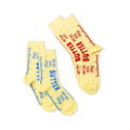 Two yellow crew socks, one pair with blue 'BUTTER' text, and a single sock with red 'BUTTER' text, displayed together.