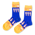 Royal blue crew socks with an anchovy pattern, featuring bright yellow toes and cuffs with retro orange text and sailboats.