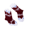 Two pairs of Kosher Salt socks, folded flat and angled diagonally on a black background, showing the full design.