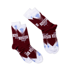 Two pairs of Kosher Salt socks, folded flat and angled diagonally on a black background, showing the full design.