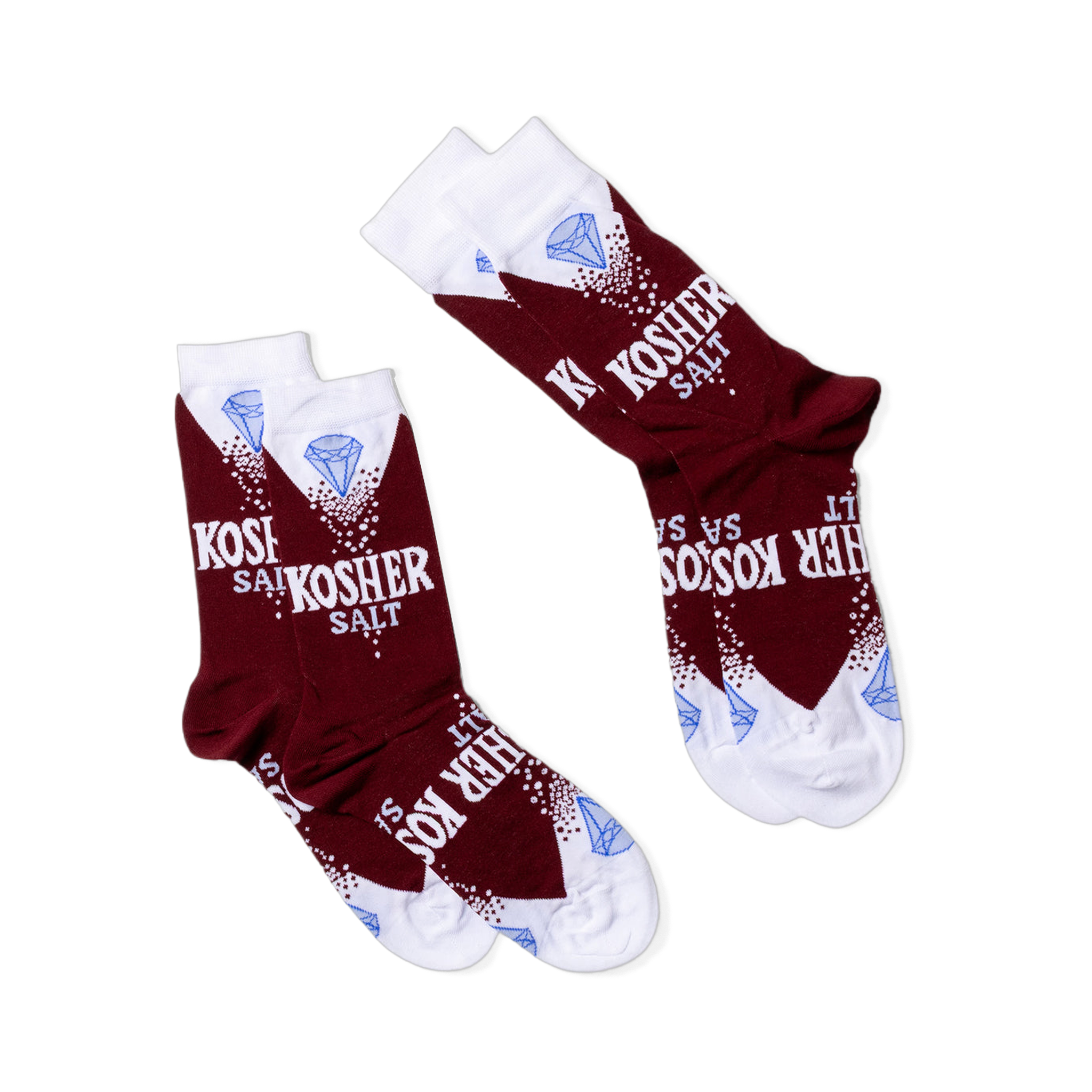 Two pairs of Kosher Salt socks, folded flat and angled diagonally on a black background, showing the full design.