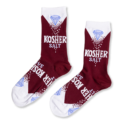 Pair of maroon crew socks with white cuffs. Design features a light blue diamond, "KOSHER SALT" text, and white salt-like dots.