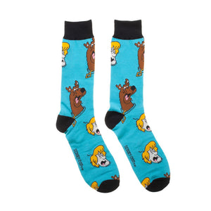 A pair of white socks with Scooby Doo, a cartoon character, on the front of each sock. The socks have purple toes and heels and blue and black striped cuffs.