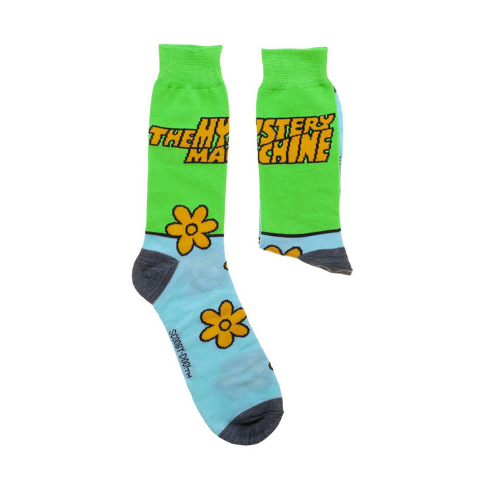 A pair of white socks with Scooby Doo, a cartoon character, on the front of each sock. The socks have purple toes and heels and blue and black striped cuffs.