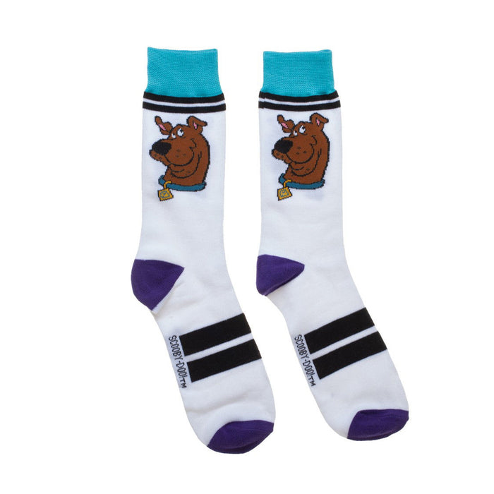 A pair of white socks with Scooby Doo, a cartoon character, on the front of each sock. The socks have purple toes and heels and blue and black striped cuffs.