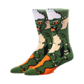 A pair of green and orange crew socks featuring a Gremlin character design. The socks are shown from the side, highlighting the character's face and body.