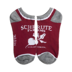 Close-up of a pair of red Schrute Farms ankle socks with gray trim.