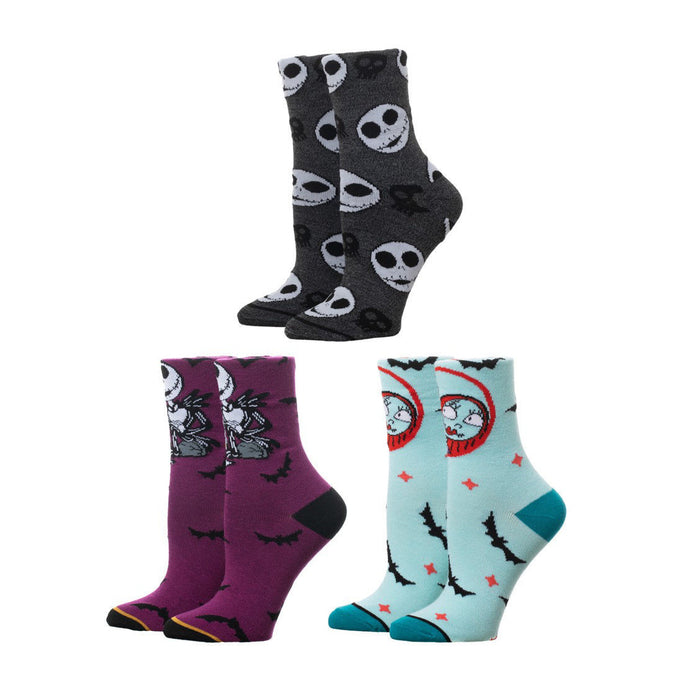 A pair of gray socks with a pattern of Jack Skellington faces from The Nightmare Before Christmas.