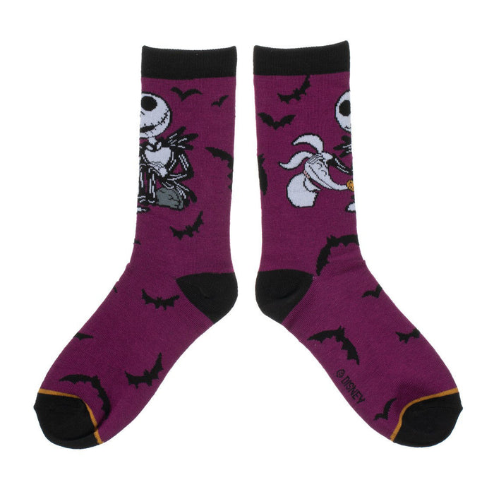 A pair of gray socks with a pattern of Jack Skellington faces from The Nightmare Before Christmas.