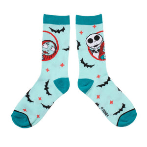 A pair of gray socks with a pattern of Jack Skellington faces from The Nightmare Before Christmas.