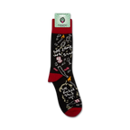 A close-up shot of the 'We Came, We Saw, We Fucked Shit Up' socks still on the retail packaging.