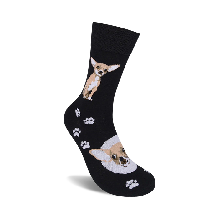 A black sock with a pattern of cartoonish tan and white chihuahua dogs and brown paw prints.