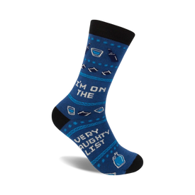 blue crew socks with black cuff and white "i'm on the very naughty list" text, snowflakes and martini glasses.   