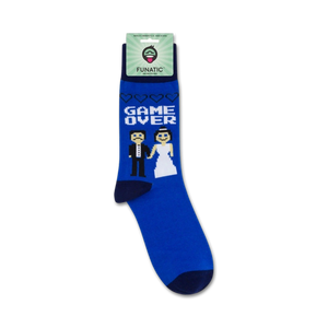 A pair of blue socks with a white pattern of a bride and groom with the text 