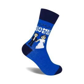 blue crew socks with black "game over" and hearts graphic on one sock and bride and groom image on the other.   